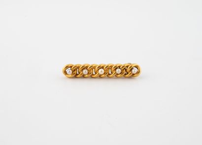 Small barrette brooch in yellow gold (750)...