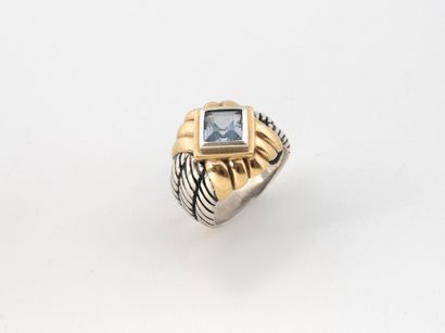 Yellow gold (375) dome ring centering a square-cut...