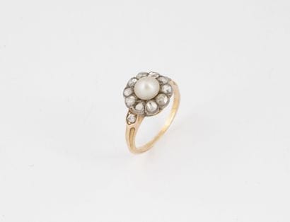 Yellow gold (750) and silver (800) flower...
