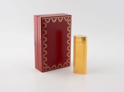Must de CARTIER
Gold-plated pocket lighter...