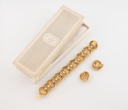 Christian DIOR
Demi-parure en métal doré...