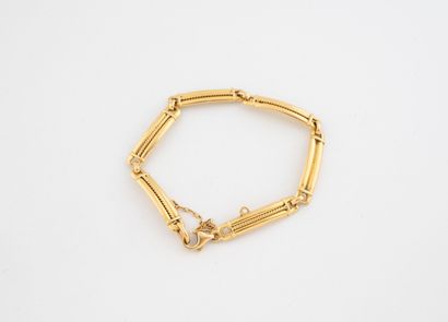 Bracelet articulé en or jaune (750) à maille...