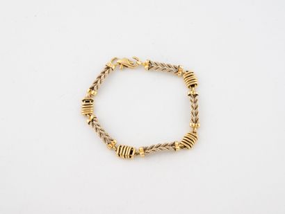 Yellow gold (750) bracelet with rigid twisted...