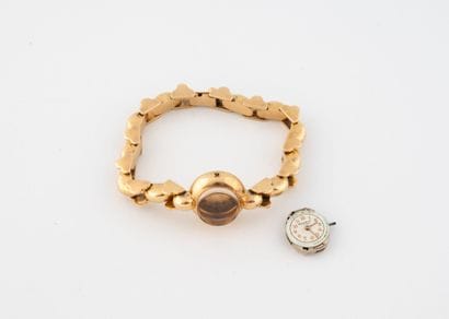 BONHEUR
Montre bracelet de dame en or jaune...