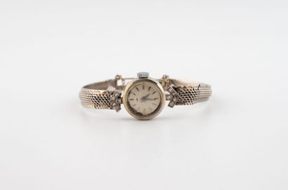 LIP
Montre bracelet de dame en or gris (750).
Boîtier...