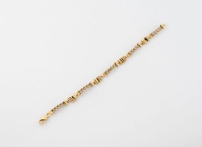 Yellow gold (750) bracelet with rigid twisted...