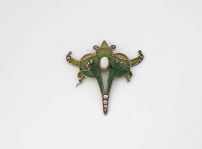 Green-shaded plique enamel pendant centered...