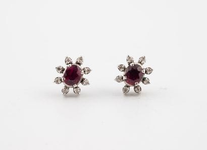Paire de clous d'oreilles façon marguerite...