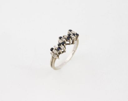 White gold (750) ring set with small diamonds...