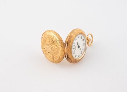 Montre de col en or jaune (750).
Boîtier...