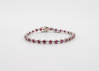 Bracelet ligne en argent (800) et or gris...