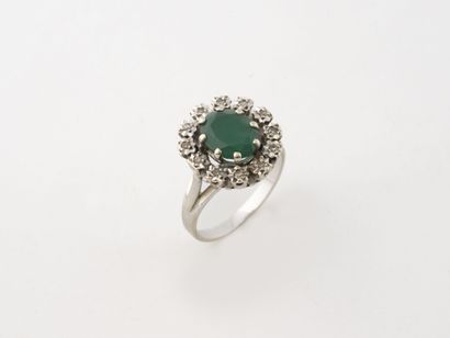 Bague marguerite en or gris (750) centrée...