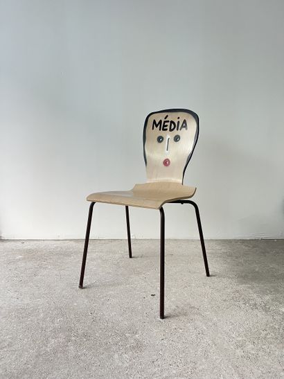 media - second-hand chair customized by cutting...