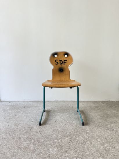 SDF - second-hand chair customized by cutting...