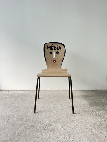 media - second-hand chair customized by cutting...