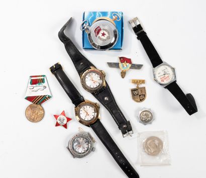 U.S.S.R., 20th century
- Four metal wristwatches.
One...