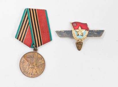 U.S.S.R., 20th century
- Four metal wristwatches.
One...