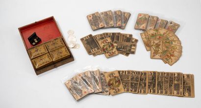 - a box containing four small wooden token...