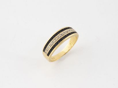Yellow gold (750) band ring with two rows...