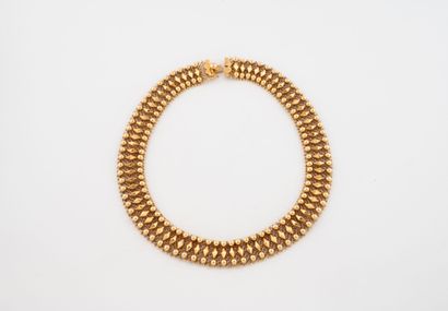 Yellow gold (750) openwork ribbon necklace.
Ratchet...
