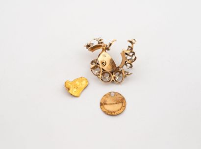 Débris d'or jaune (750).
Poids : 5.7 g.