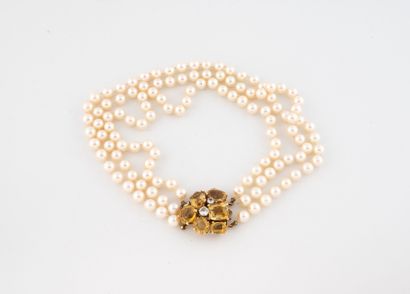 White cultured pearl choker necklace centered...