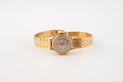 NERLEX
Ladies' watch in yellow gold (750).
Round...