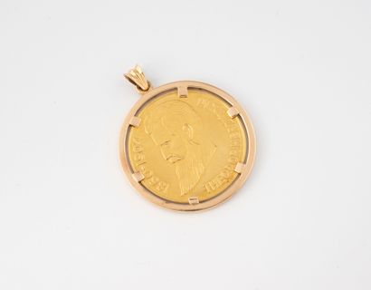 Yellow gold (750) pendant centered with an...