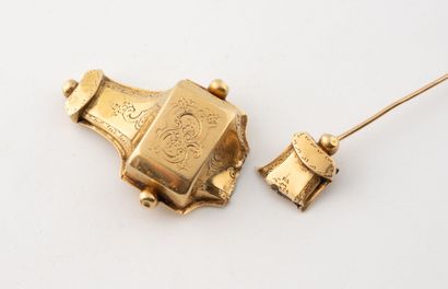 Débris de broche en or jaune (750).
Poids...