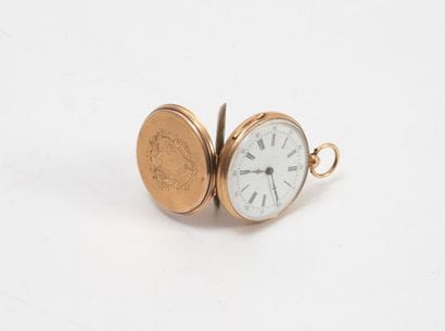 Yellow gold (750) collar watch.
White enameled...