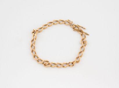 Yellow gold (750) bracelet with filed gourmette...