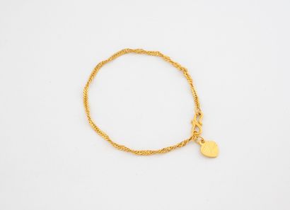 Bracelet en or jaune (750) à maille gourmette...