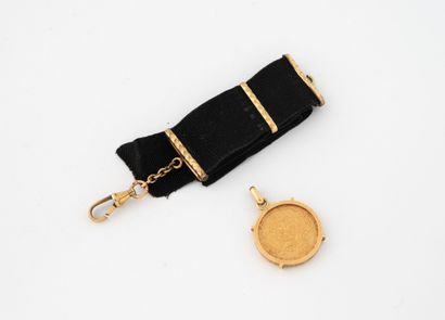 Yellow gold (750) pendant centered with a...
