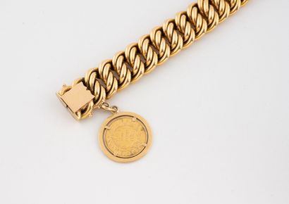 Hollow American link bracelet in yellow gold...