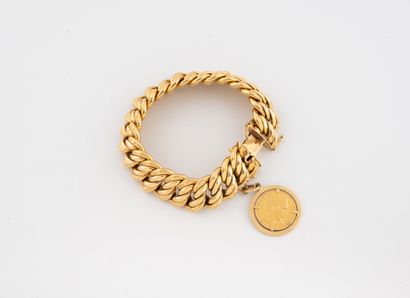 Hollow American link bracelet in yellow gold...