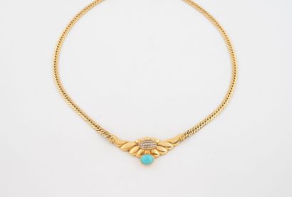 Yellow gold (750) necklace featuring a flattened...