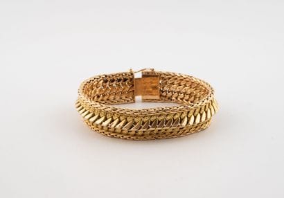 Gourmette bracelet in yellow and pink gold...