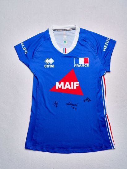 French women's volleyball team blue jersey...