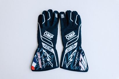 OMP gloves worn and signed by Sébastien Ogier...