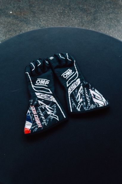 OMP gloves worn and signed by Sébastien Ogier...
