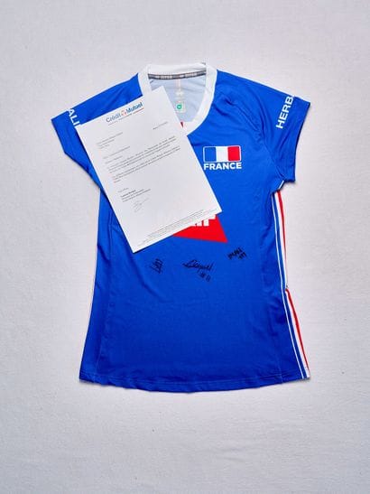 French women's volleyball team blue jersey...