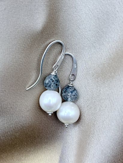 Earrings on a hook adorned with pearls ,...
