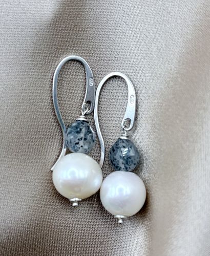 Earrings on a hook adorned with pearls ,...