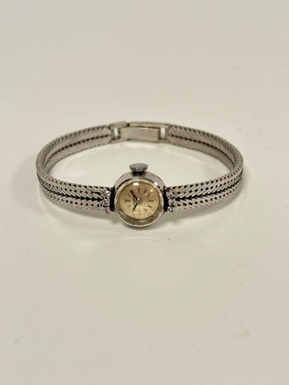 COSMOS
Ladies' wristwatch in white gold (750),...