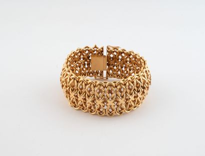 Bracelet articulé en or jaune (750) à maille...