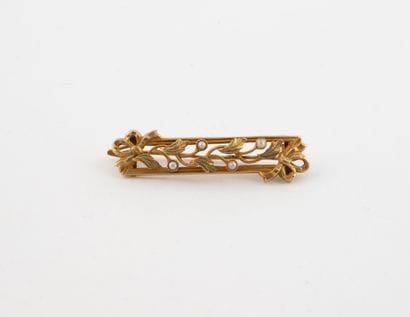 Small barrette brooch in yellow gold (750)...