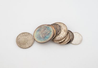 Lot of silver coins including:
- Two 50-franc...