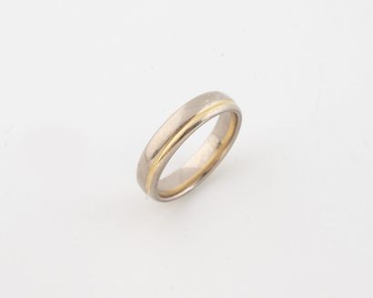 Wedding band in yellow and white gold (750).
Weight:...