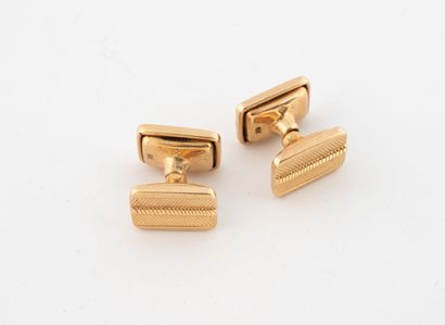Pair of yellow gold (750) cufflinks set with...
