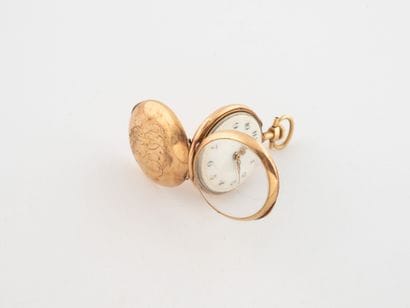 Yellow gold (750) collar watch. 
White enameled...